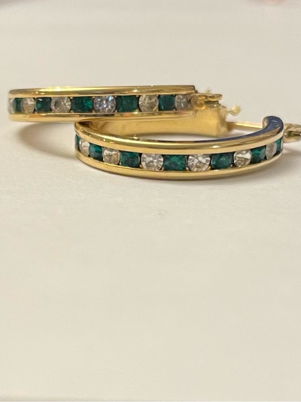 Gold Hoop Earrings with Emerald and White Stone Accents